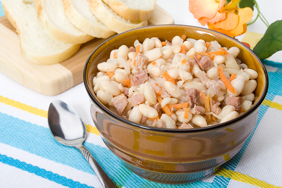 Navy Bean and Potato Soup Foodservice Recipe with Cook's Delight® Ham Soup Base in a stock pot