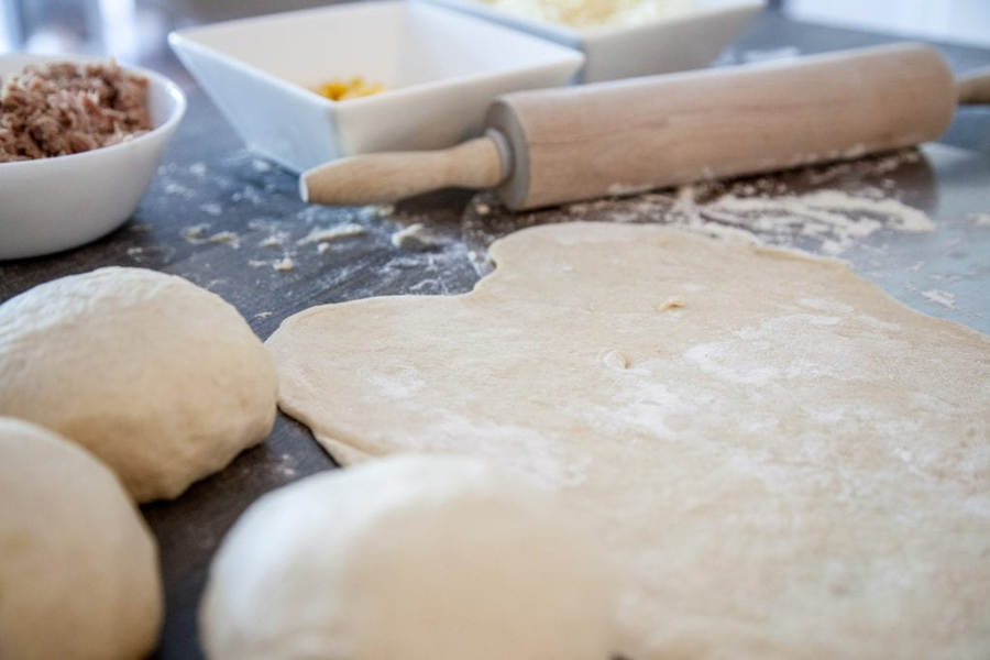 Pizza dough flavored with Cook's Delight Roasted Garlic soup base concentrate