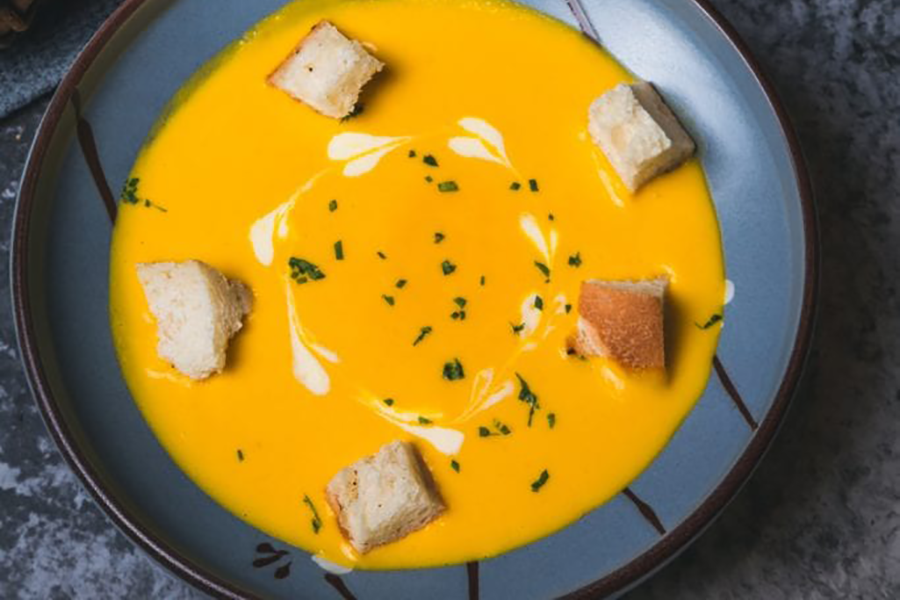 Butternut Squash soup and croutons made with Cook's Delight vegan vegetable soup stock